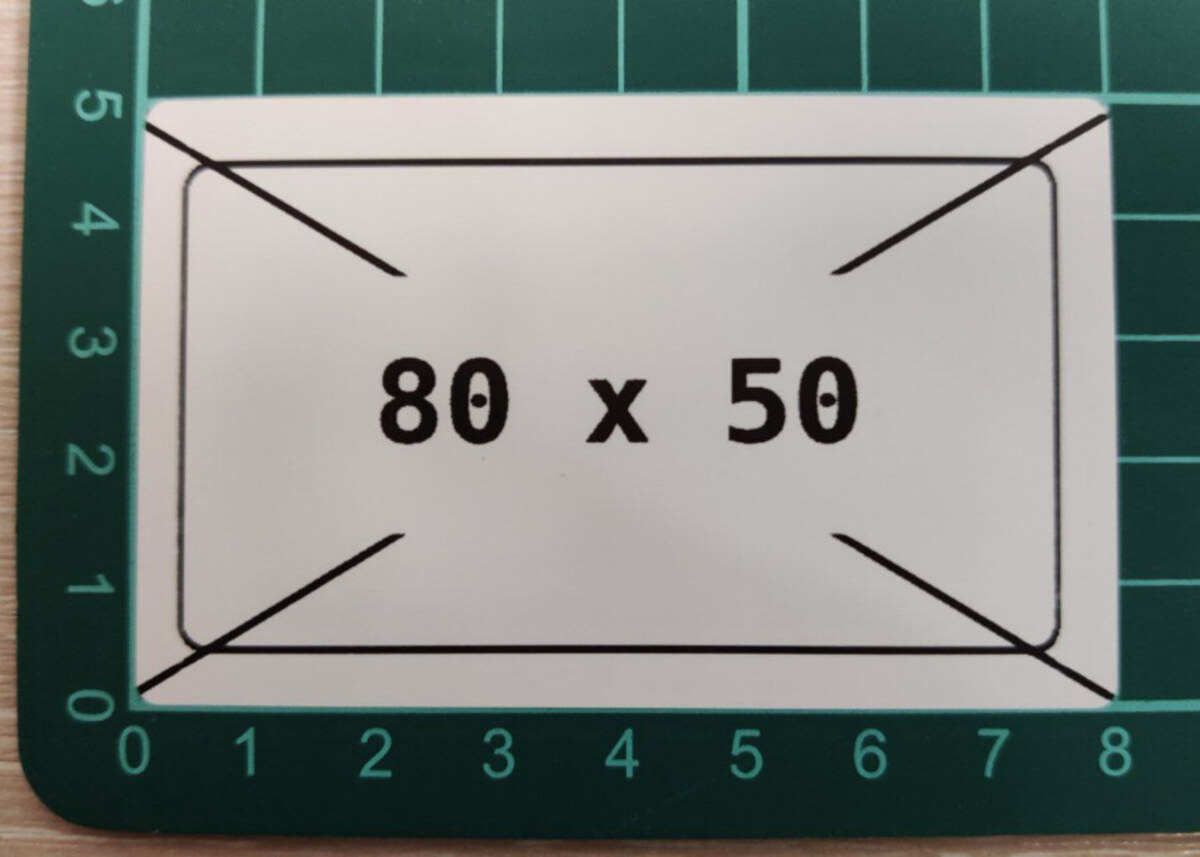 A 50×30 mm label rendered at 8 px/mm (203 dpi) — the resolution every raster path has to respect Real 50×30 mm label printed from Niimbot B21 using niimprint